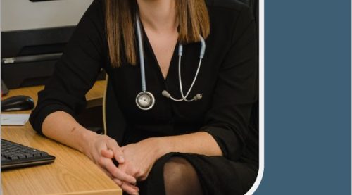 A young female doctor is wearing a stethoscope around her neck while seated in front of her office desk. It reads, "Greater Manchester People and Culture Strategy 2022-2025. Setting out a shared ambition for the health and care workforce.