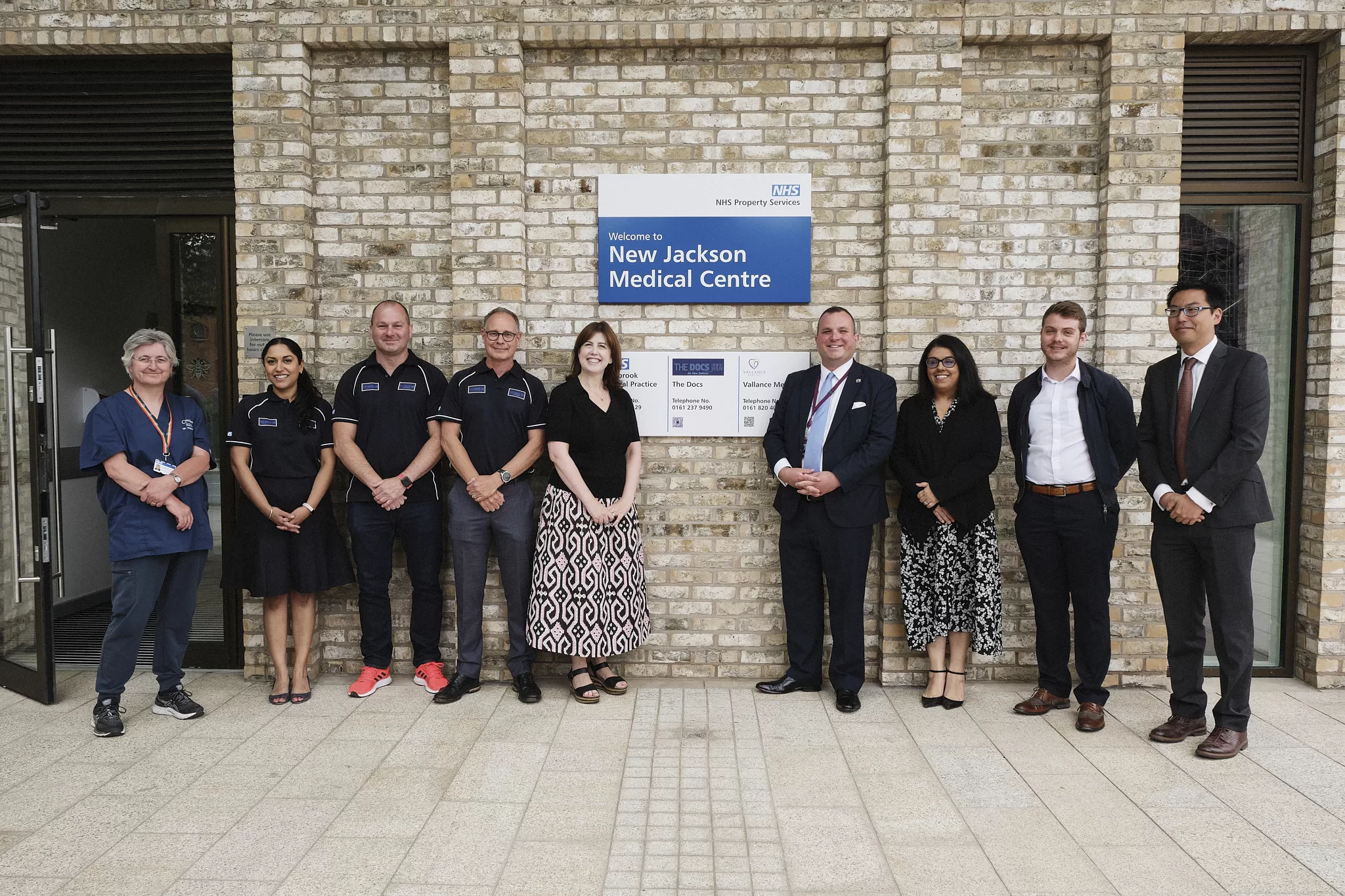 • Manchester Central MP Lucy Powell joins Dr Manisha Kumar, Chief Medical Officer of NHS Greater Manchester Integrated Care, Manchester City councillors Thomas Robinson and Marcus Johns, and GP partners of the three resident practices at New Jackson Medical Centre.