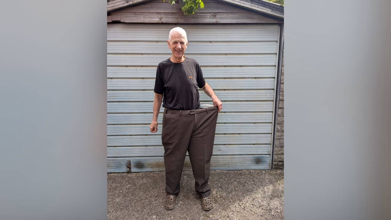 John showing off his weightloss from the type two diabetes prevention programme.