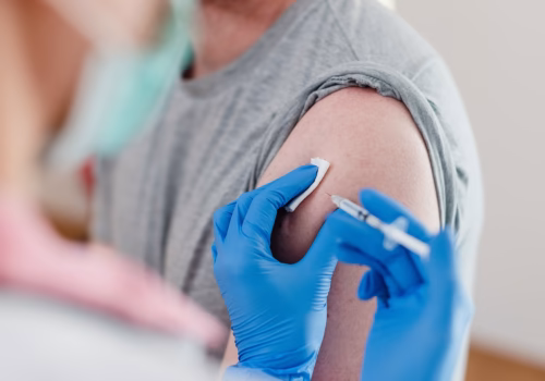 Patient in Greater Manchester receiving COVID-19 vaccine.