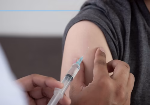 A person having a vaccine.