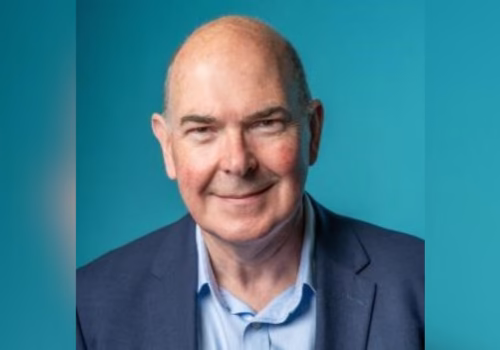 Head and shoulders shot of NHS GM chief executive Mark Fisher who is to retire.