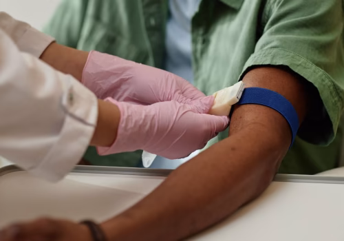 A person being prepared to have their blood taken