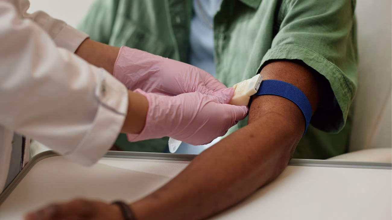 A person being prepared to have their blood taken