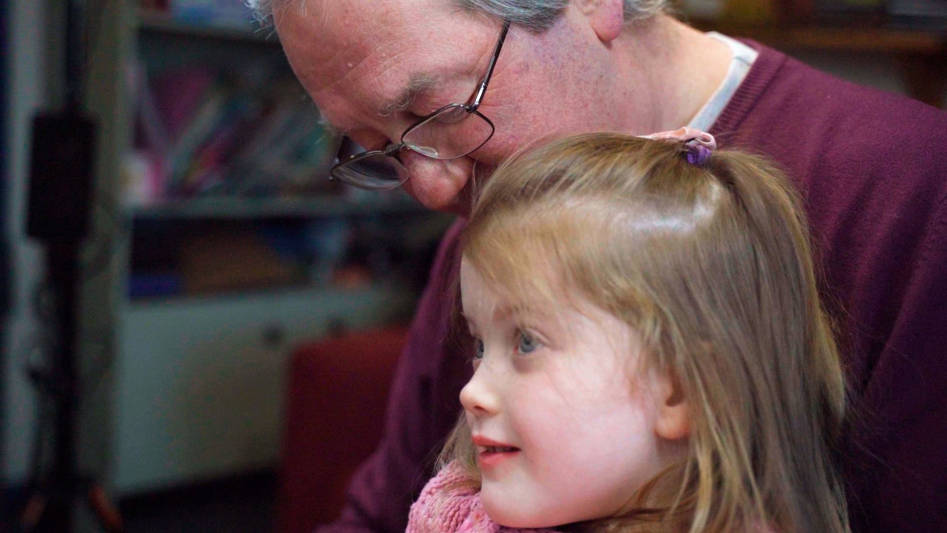 Older people with young grandchild.