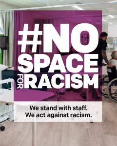 Image of a hospital ward with text. Text reads No Space For Racism. We stand with staff. We act against racism.