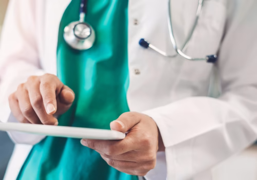 image of a doctor using an ipad