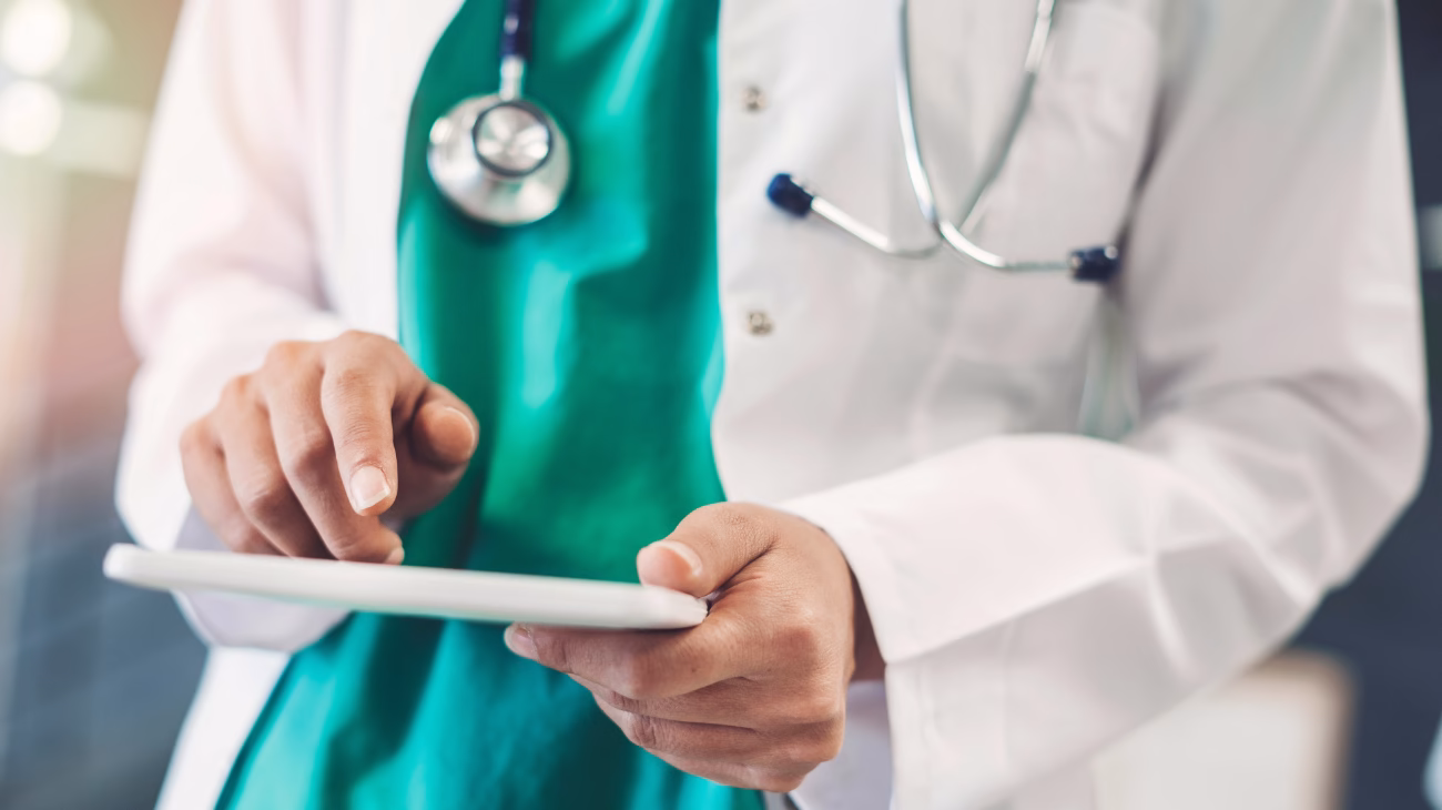 image of a doctor using an ipad