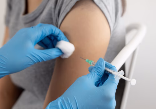Person receiving a vaccination