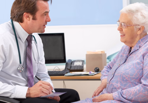 GP talking to an elderly person
